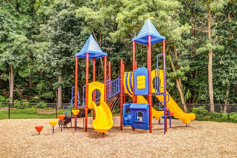 Children's playground with multiple slides
